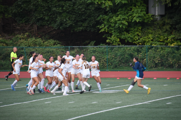 Above: The Cresskill Girls Soccer Team celebrating together.